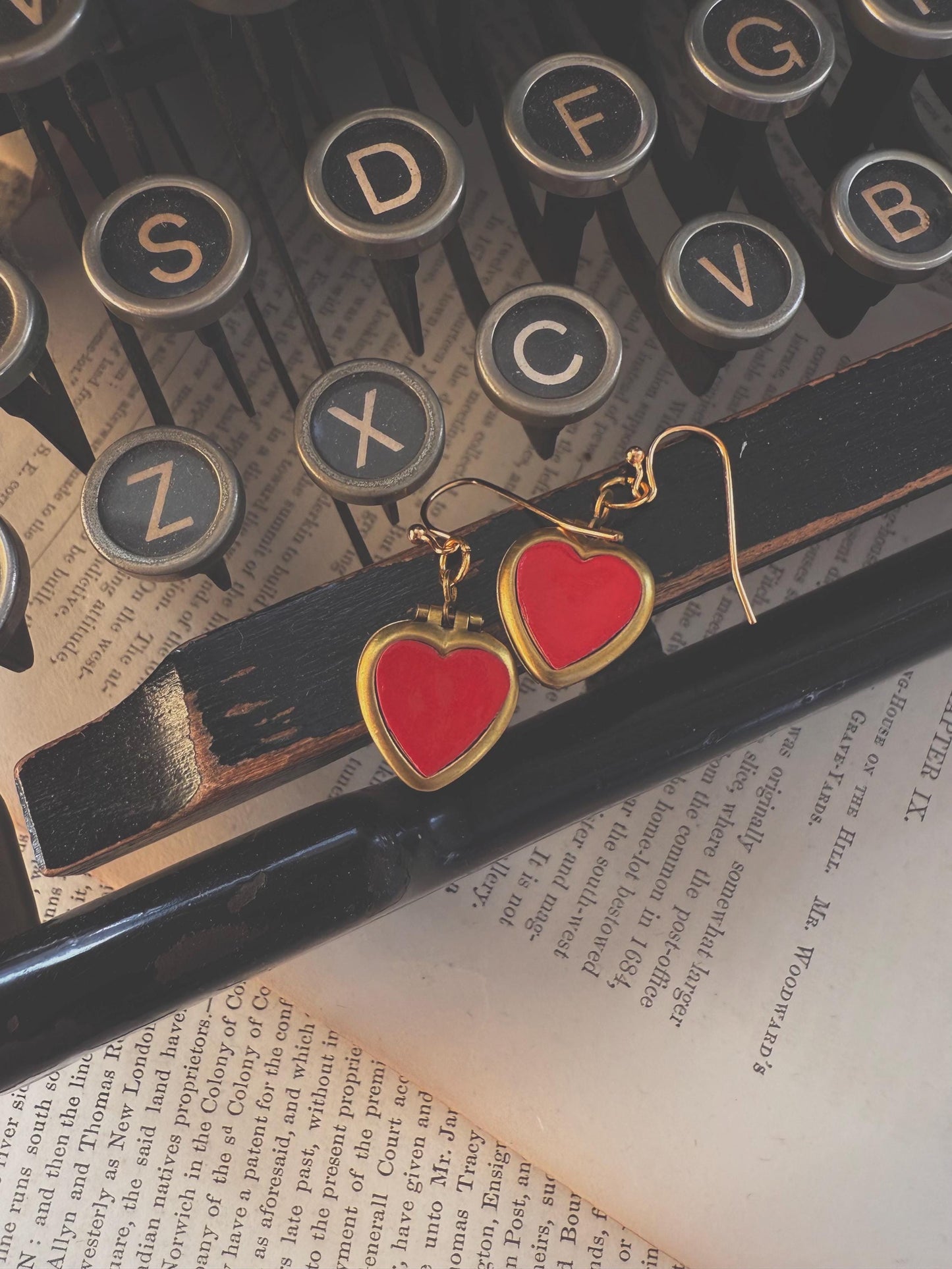 Shiny red heart locket earrings, raw brass lover hearts, romantic, timeless, and perfect for gifting