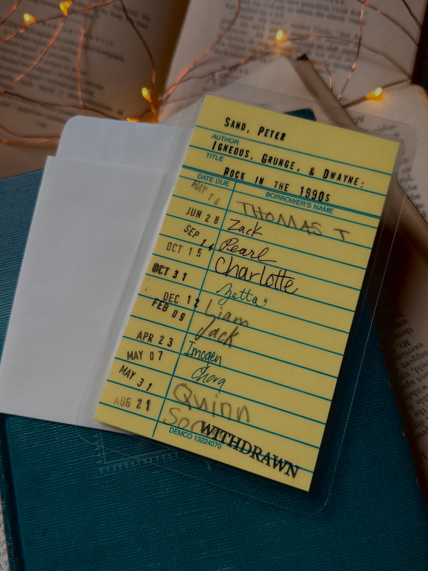 Rock in the 1990s yellow library due date card bookmark, laminated