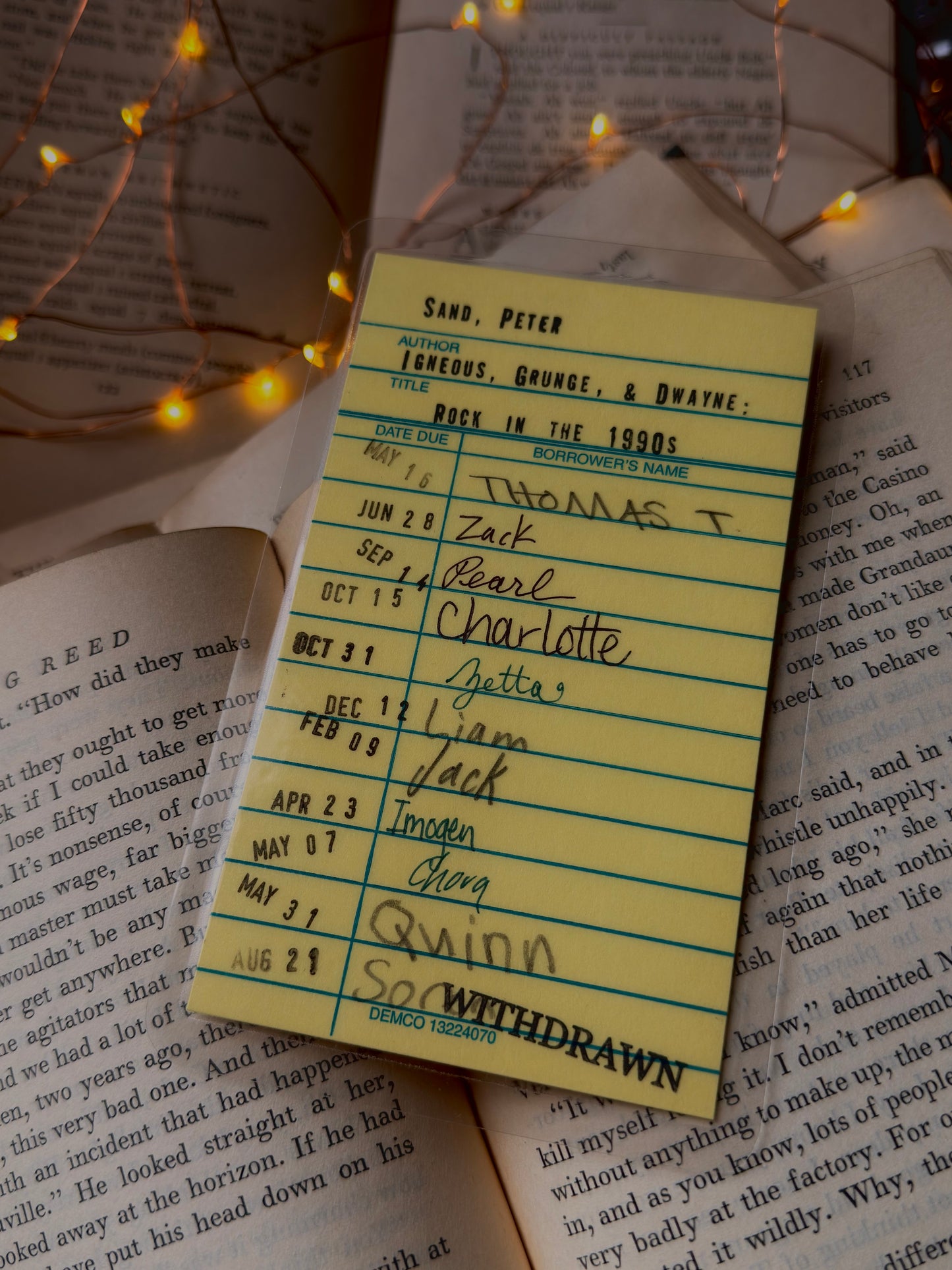 Rock in the 1990s yellow library due date card bookmark, laminated