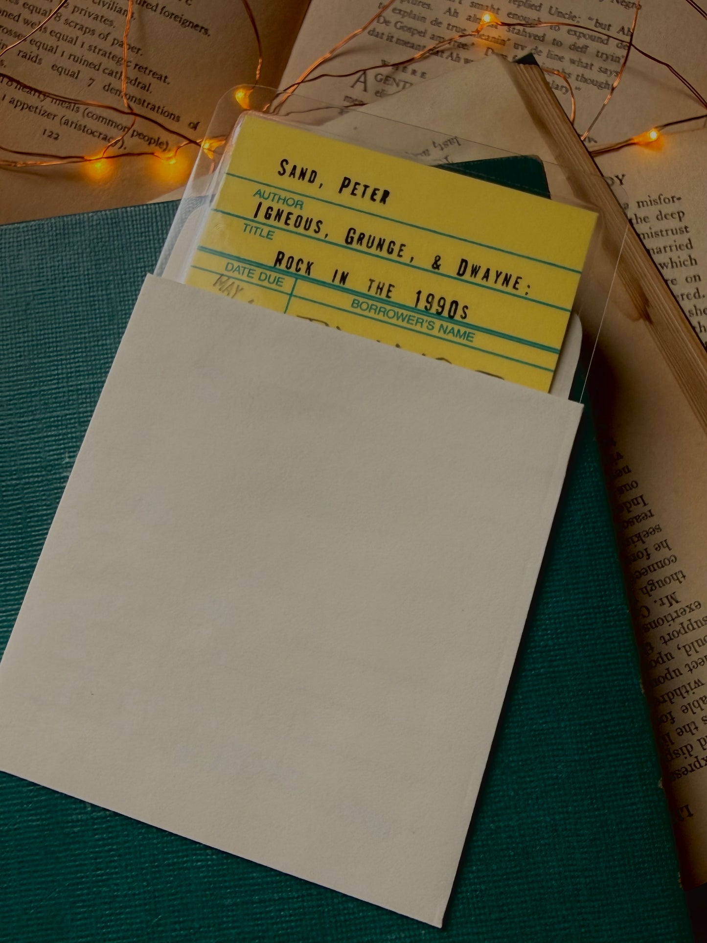 Rock in the 1990s yellow library due date card bookmark, laminated