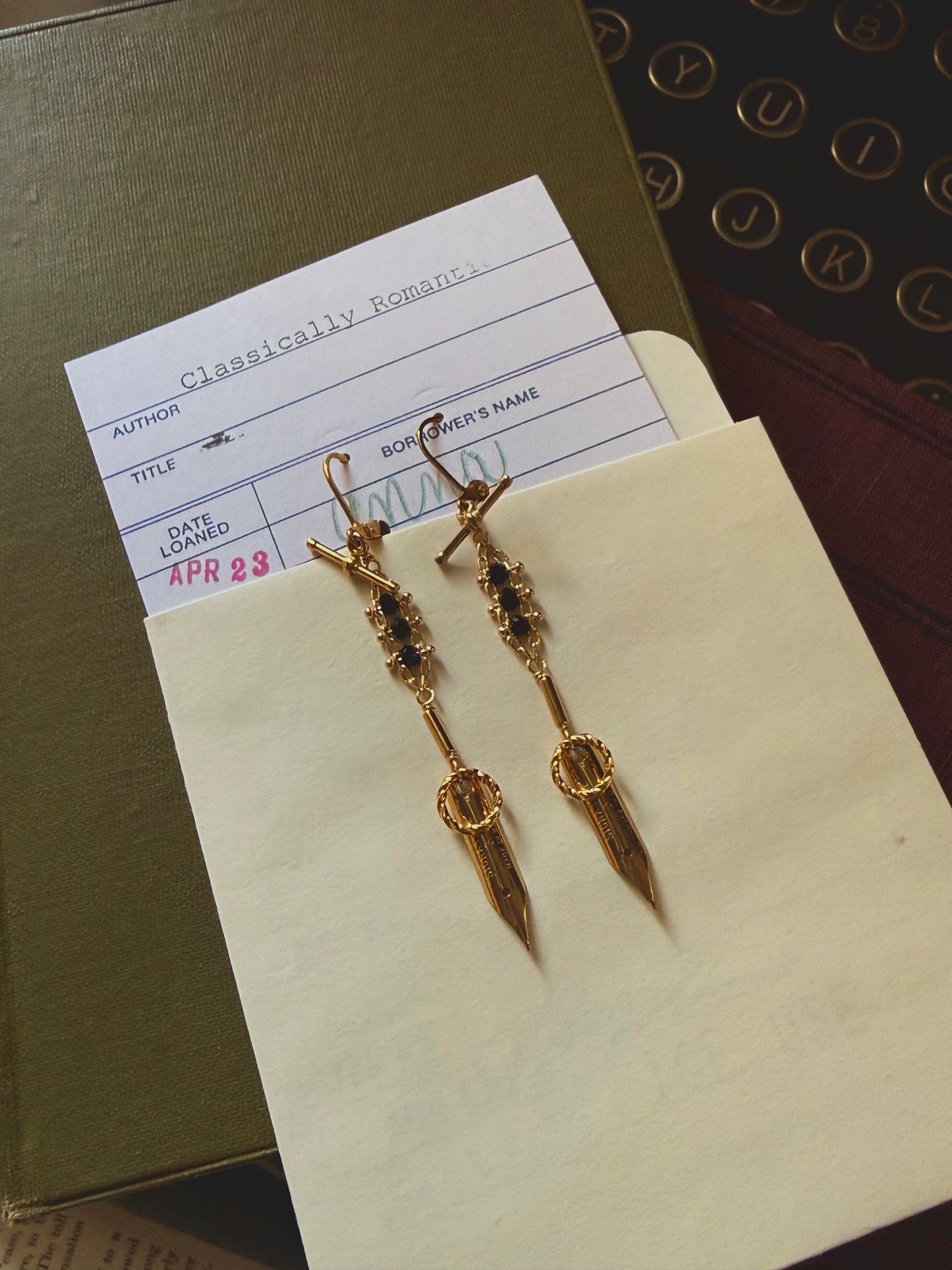 Line and curve designed vintage pen nib earrings