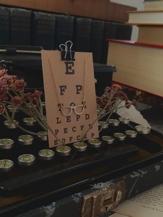 Gold eyeglass charm necklace, librarian gift, bookish jewelry, optical jewelry, optician jewelry, Four Eyes Are Better Than None